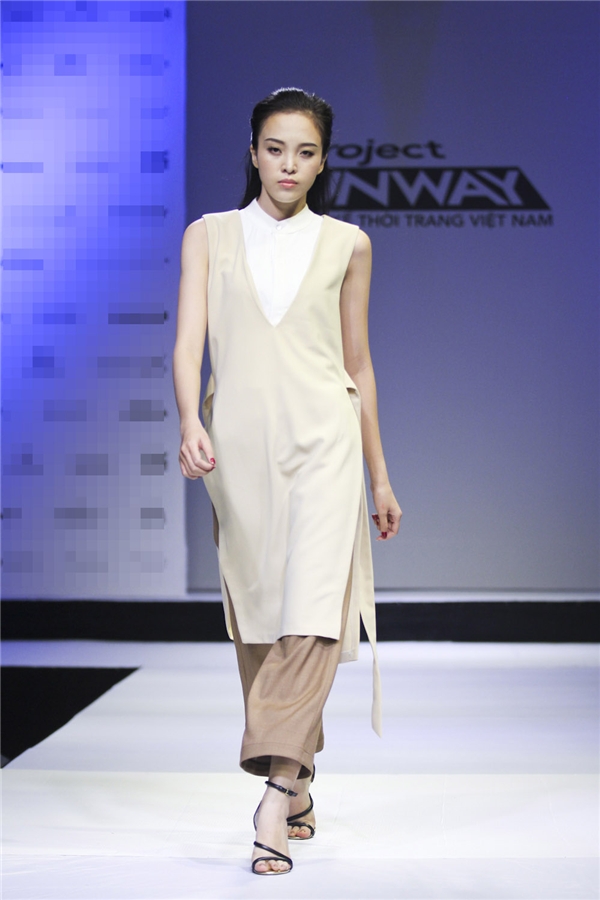 
Lê Thị Trang và mẫu thiết kế mang đậm âm hưởng thời trang Thu - Đông.